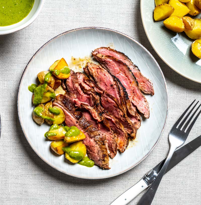 The 'grate outdoors' at home: Step up your steak night with cumin-rubbed flank and chimichurri potatoes
	