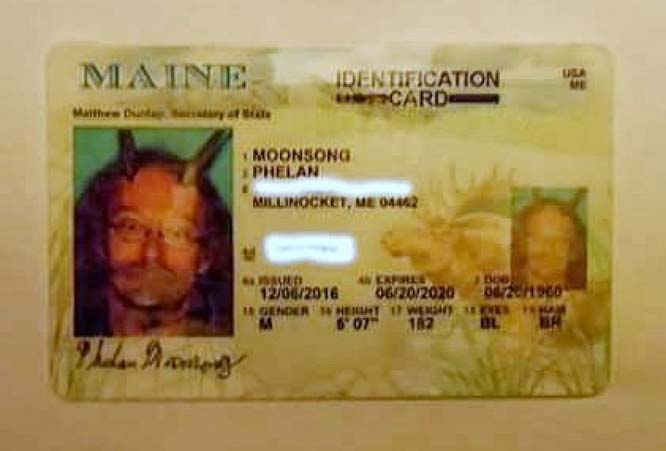 Pagan priest wins right to wear goat horns in license photo, saying they are 'religious attire'
	
