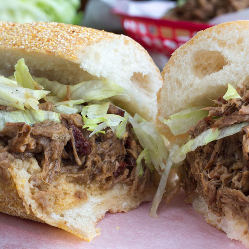 Chunky bits of beef melting in your mouth: Drippy, sloppy, saucy Po' Boy -- reigning king of New Orleans sandwiches -- is a garlicky slow-cooked delight swimming in its own rich, roux-thickened gravy
