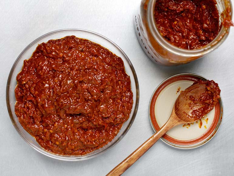 Is this Tunisian chile paste the new sriracha? Not yet, but it sure should be ( 2  RECIPES, INCL. AN ENTREE)
 
  
  