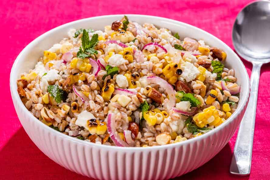 Charred sweet corn is the star of the versatile summer salad
	