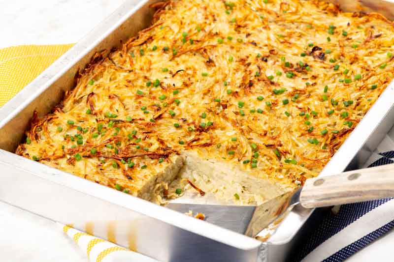 This Potato Kugel turns a handful of humble, pedestrian ingredients into a comfort food at once luxurious and quotidian
	