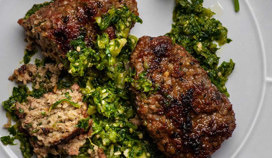 Middle-Eastern BBQ! These  rich, succulent patties --  drizzled with a lemony three-herb sauce -- are made with a surprise ingredient resulting in wonderful texture and earthy, nutty taste 
  
  