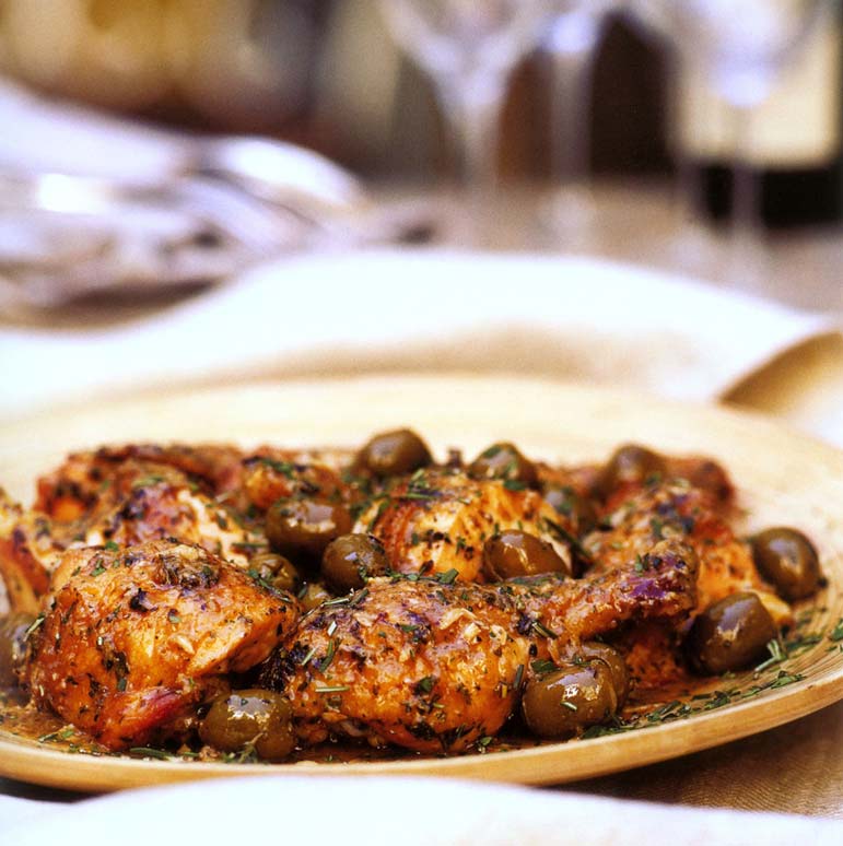  MUSIC TO YOUR . . . MOUTH. A symphony of flavors:  Roast herbed chicken with caramelized garlic, dates, lemon and olives