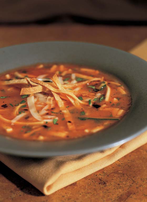 Hearty tortilla soup is spicy and colorful --- and a cinch to make