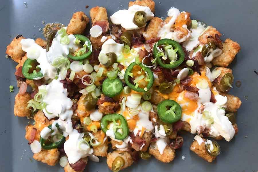 This outrageous mix is a fully loaded, not-quite-nacho feast --- and summer's go-to side dish
	
	