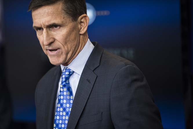 As Flynn falls under growing pressure over Russia contacts, Trump remains silent
 
 
  